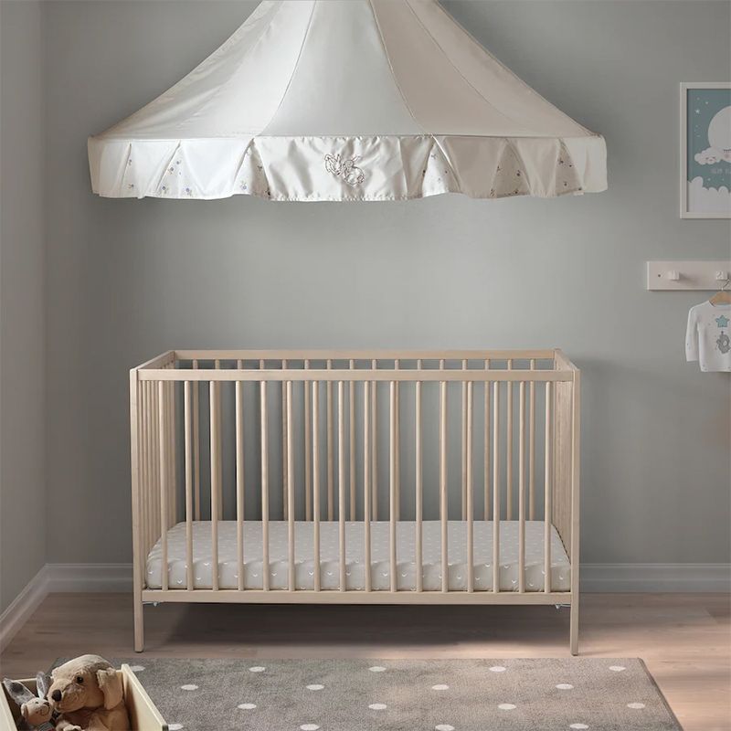 Traditional Nursery Crib with Adjustable Height in Natural Wood