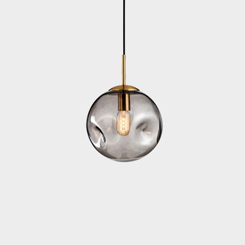 1 pendentif en forme de globe léger avec une nuance en verre fermée