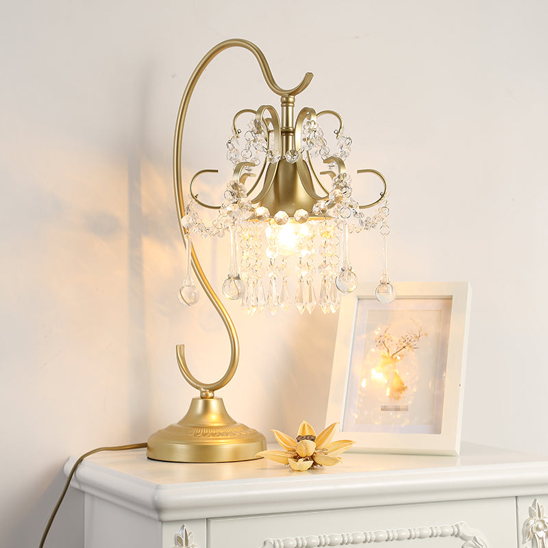 1 lampe de table à dos de bras plié la tête