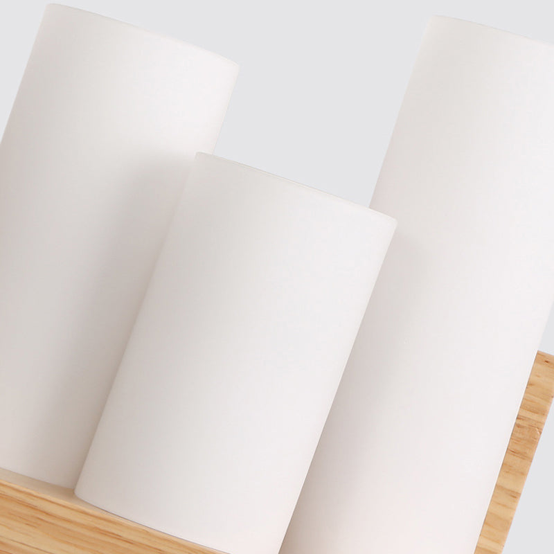 Zeitgenössische Röhrchen Schatten Wandbeleuchtung 3-Kopf-Milchglaswandlampe mit Holzregal für Stoffladen