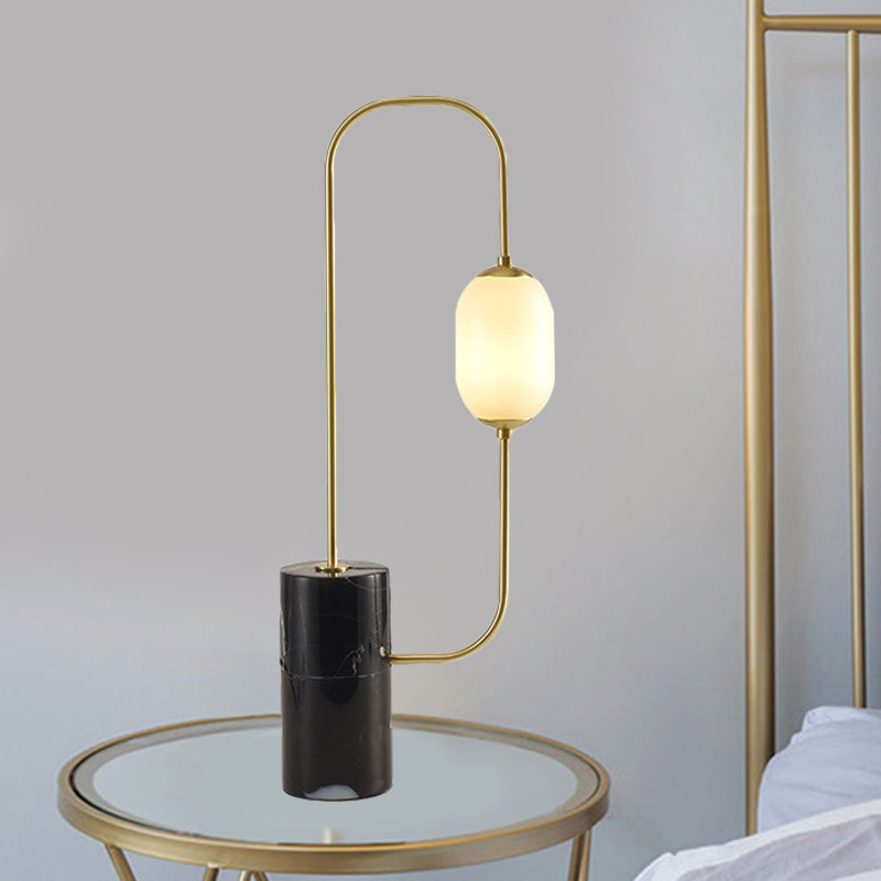 Designador de lámpara de mesita de noche de circuito iluminación de mesa negra y dorada de vidrio mate con base de mármol de cilindro