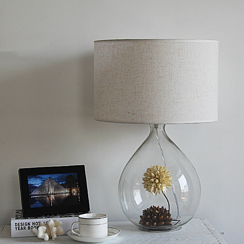 Trommelrestaurant tafel licht pastorale stof 1-head room grijze nachtlamp met heldere glazen basis en gedroogde bloem