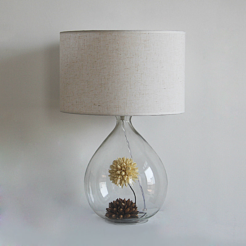 Trommelrestaurant tafel licht pastorale stof 1-head room grijze nachtlamp met heldere glazen basis en gedroogde bloem