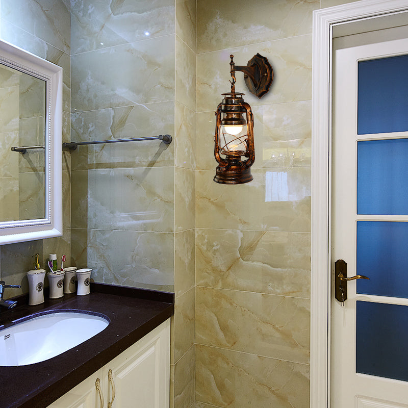 One Bulb Wall Light with Lantern Shade Clear Glass Coastal Bathroom Sconce in Antique Copper