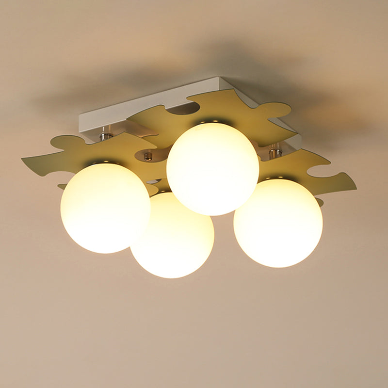 Globe di vetro bianco semi-filo modernista Modernist 4-bulb Luce a filo con decorazione puzzle in grigio/verde