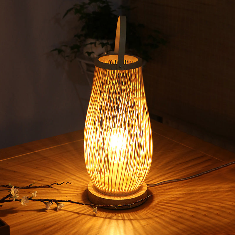 Lampada da tavolo da letto a bulbo singolo stile asiatico manico curvo beige illuminazione da scrivania con cesto tonalità di bambù