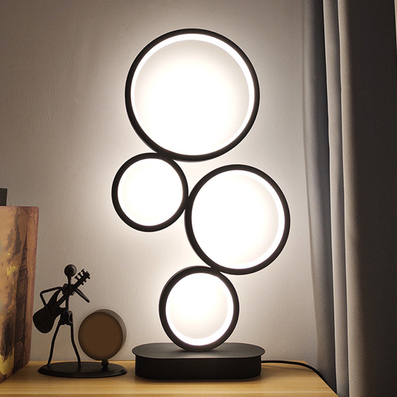 Lampada da tavolo rotonda semplice Implesatura Metallic LED Illuminazione notturna con piedistallo circolare in luce nera, calda/bianca