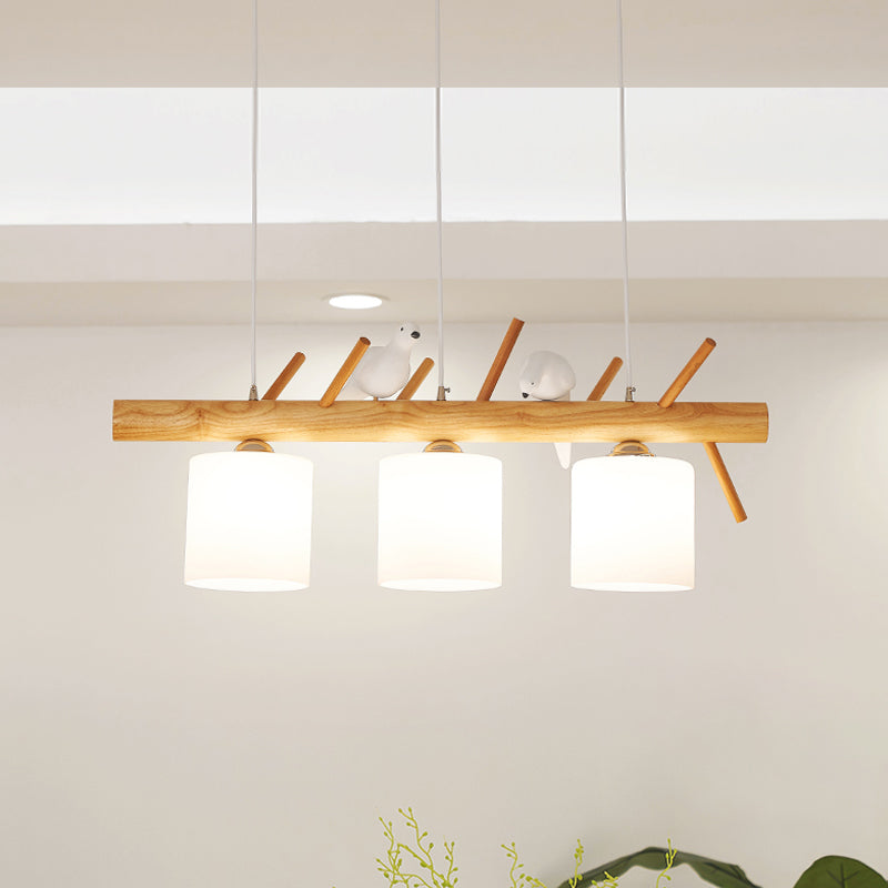 Beige Drum Island Lighting Ideas Simple 2/3 Heads Opaque Glass Pendant Lamp with Bird on Wood Branch Beam Design
