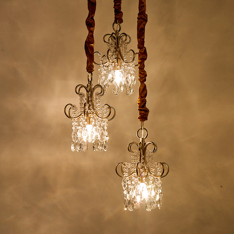 Metaal curvy arm multi hanglamp eenvoud 3 koppen gouden plafondverlichting met kristalstrengen