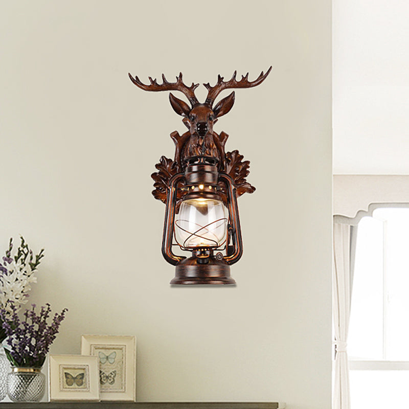 Single Flameless Kerosene Wall Lamp Rustic Style Brown/Bronze Transparent Glass Sconce with Resin Faux Elk Backplate