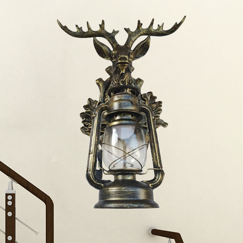 Single Flameless Kerosene Wall Lamp Rustic Style Brown/Bronze Transparent Glass Sconce with Resin Faux Elk Backplate