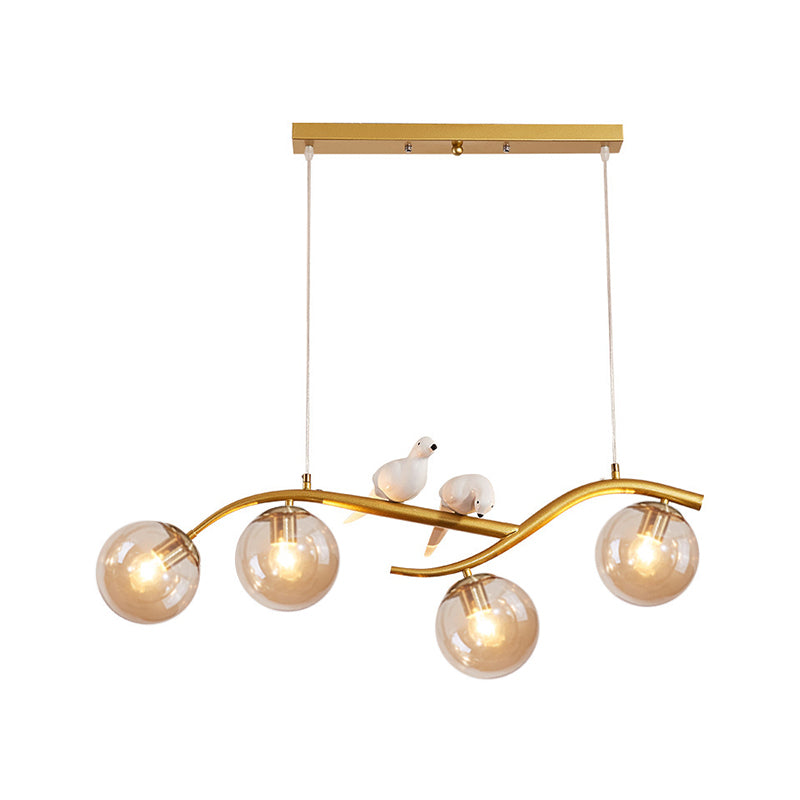 Metal Branch Hanging Lamp Contemporary 4-Light Black/Gold Island Pendant with Bird Deco and Smoke Grey/Cognac Glass Shade