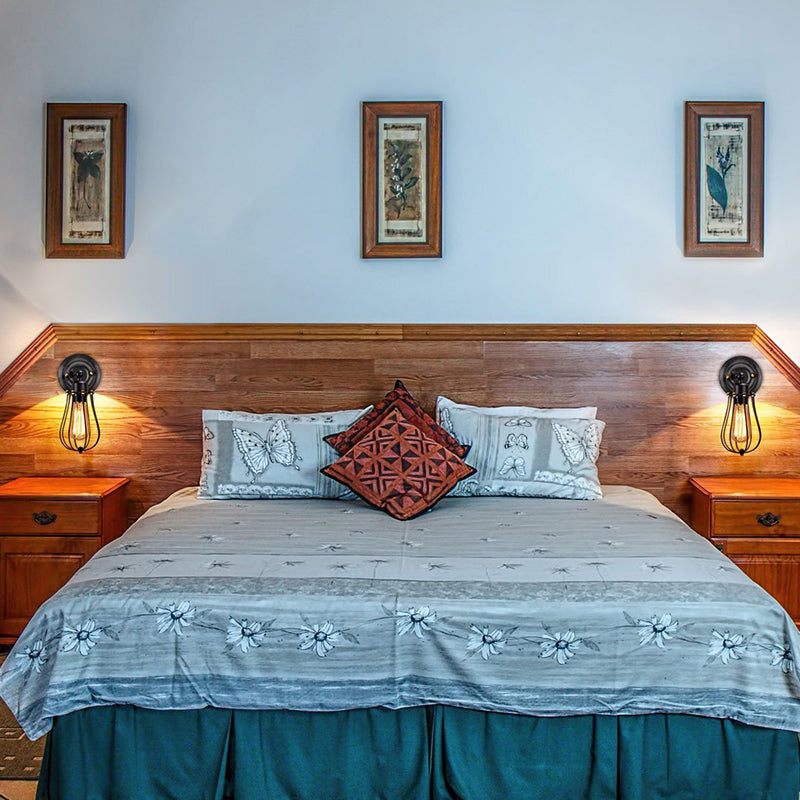 1 Glühbirne einstellbare Wandbeleuchtungsideen Loft -Stil Schlafzimmer Wandlampe mit Birneneisenkäfig in Schwarz