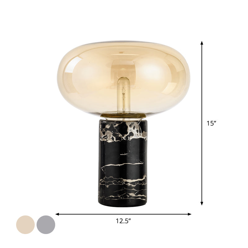 Lampada da tavolo da soggiorno ovale postmoderna in vetro grigio/ambra con 1 lampadina con base cilindrica in marmo nero