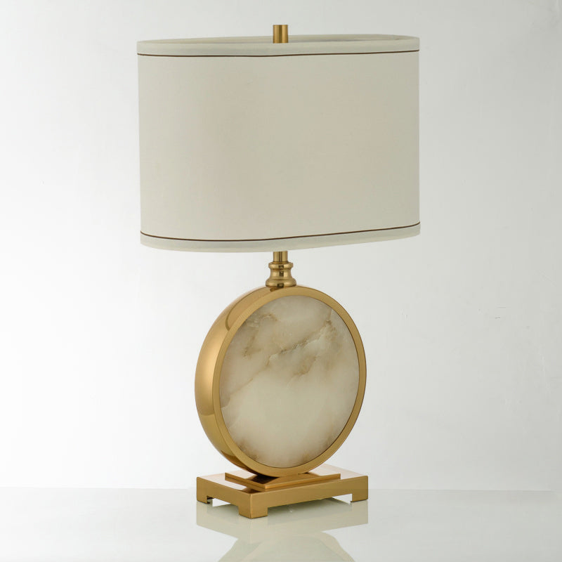 Stof ovaal nachtlamp minimalisme 1 koptafel staat licht met ronde basis in messing en wit