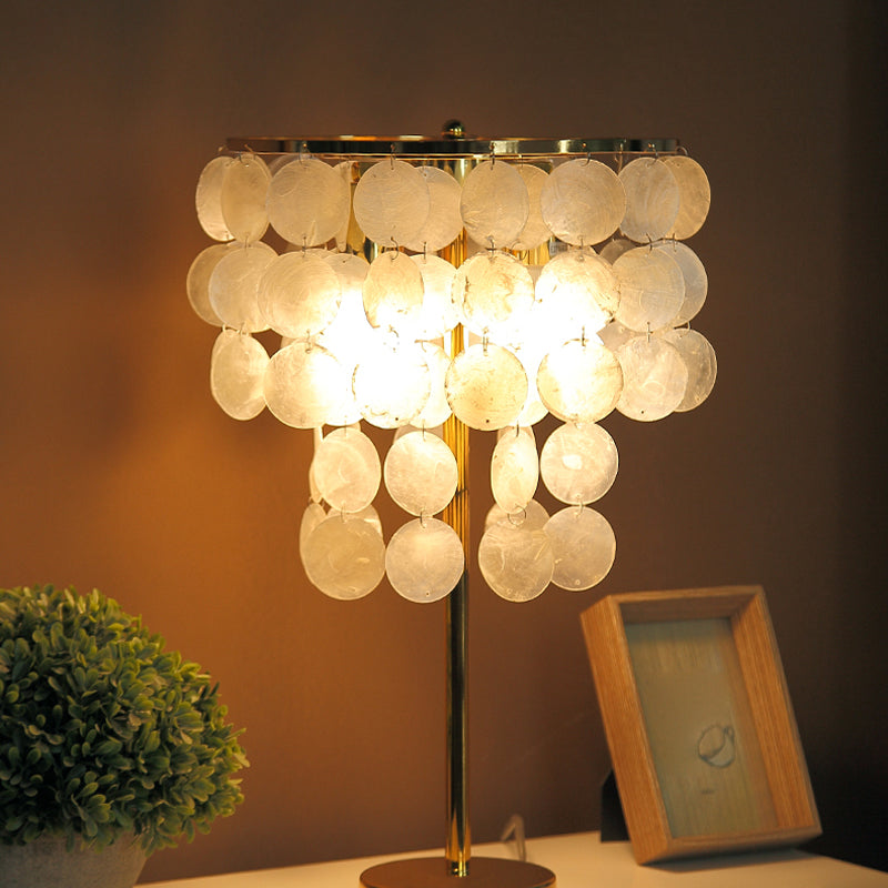 Lampe de nuit en coquille de la lampe en cascade
