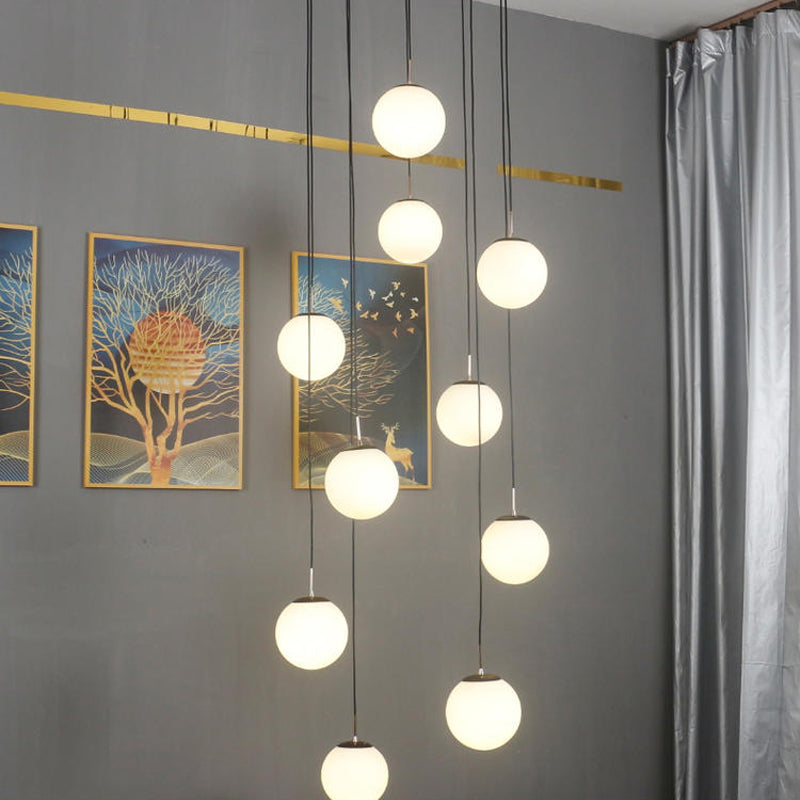 Ball Multi Pendelleuchte modernistische Cremeglas 10 Köpfe Schwarze Federlampe für Wohnzimmer