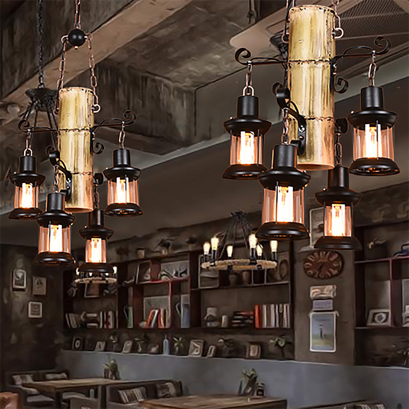 Éclairage de pendentif noir 4 lanterne légère / bougie en verre clair en verre transparent / lustre en marbre avec étagère en bambou