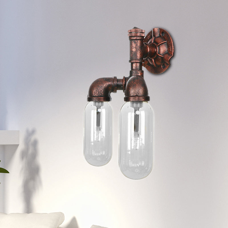 Clear Glass Capsule Sconce Lighting Industrial 2/4 Lights Bedroom Wall Mounted Pipe Light in Weathered Copper