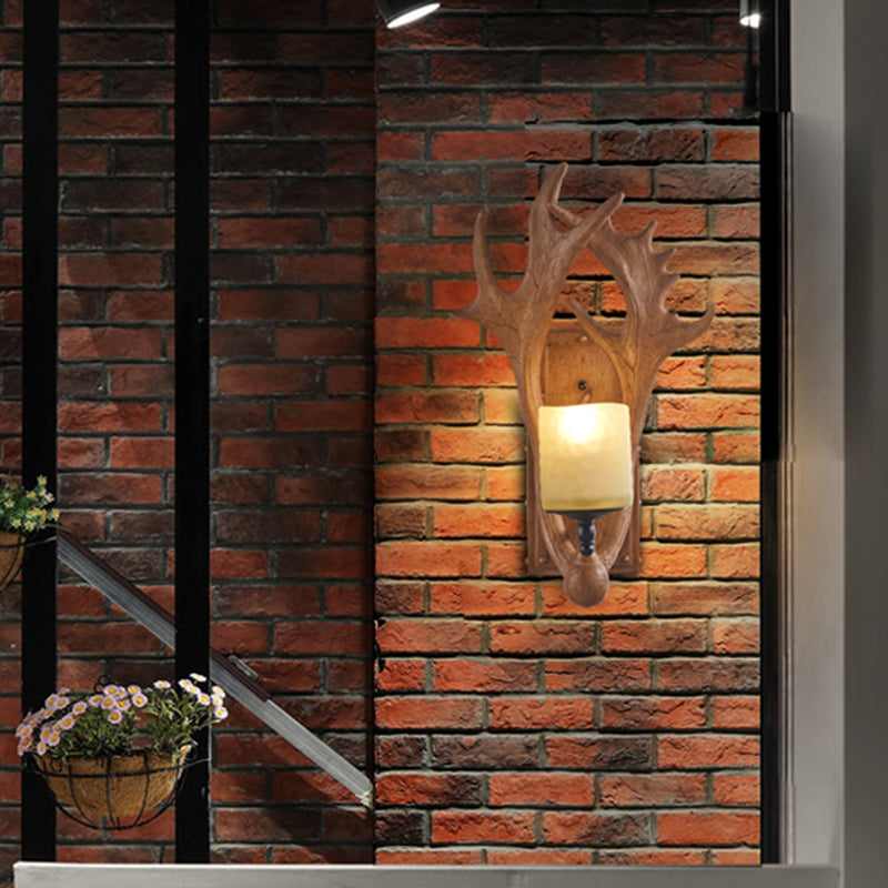 Deer Horn Resin Wall Light Vintage Restaurant Wall Mounted Lamp with Cylinder Beige Glass Shade in Brown