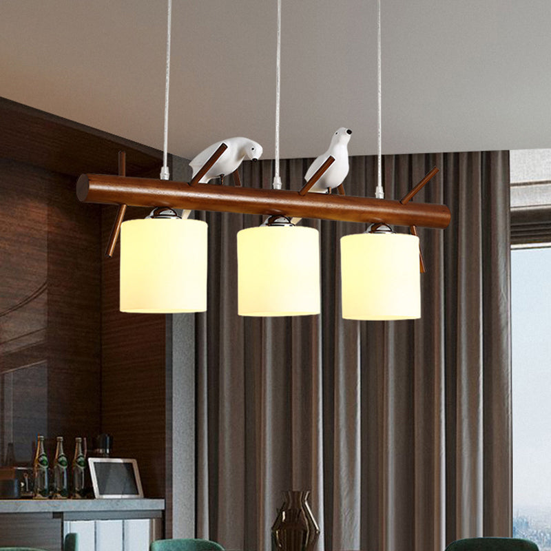 Cylinder Restaurant LED Pendant Light White Glass Simplicity Hanging Island Light with Resin Bird