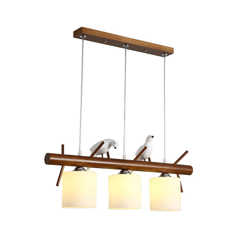 Cylinder Restaurant LED Pendant Light White Glass Simplicity Hanging Island Light with Resin Bird