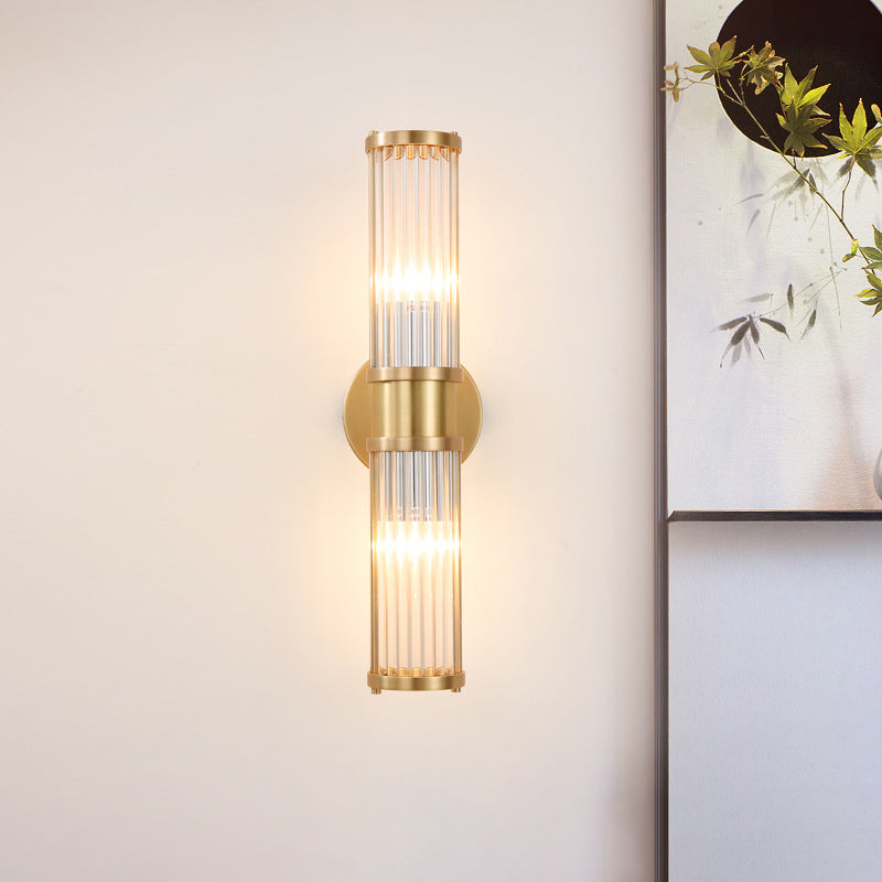 Lámpara de pared lineal de latón con estilo moderno de 2 luces claras de pared de cristal aplastante con forma de cilindro