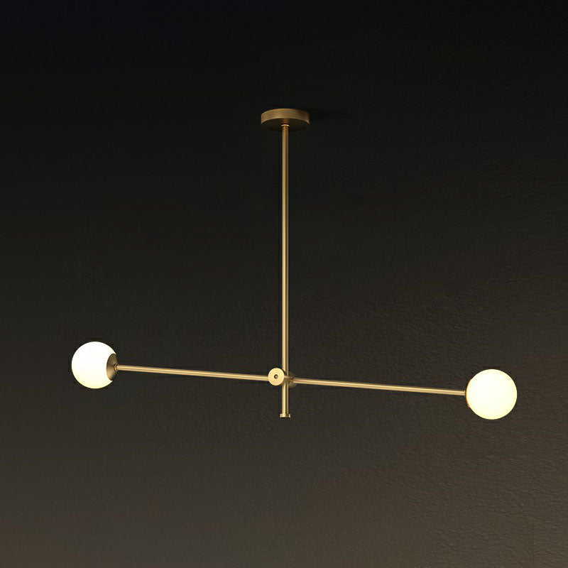Lampada sospesa del braccio girevole in metallo lampadario minimalista di finitura in ottone con tonalità in vetro a sfera