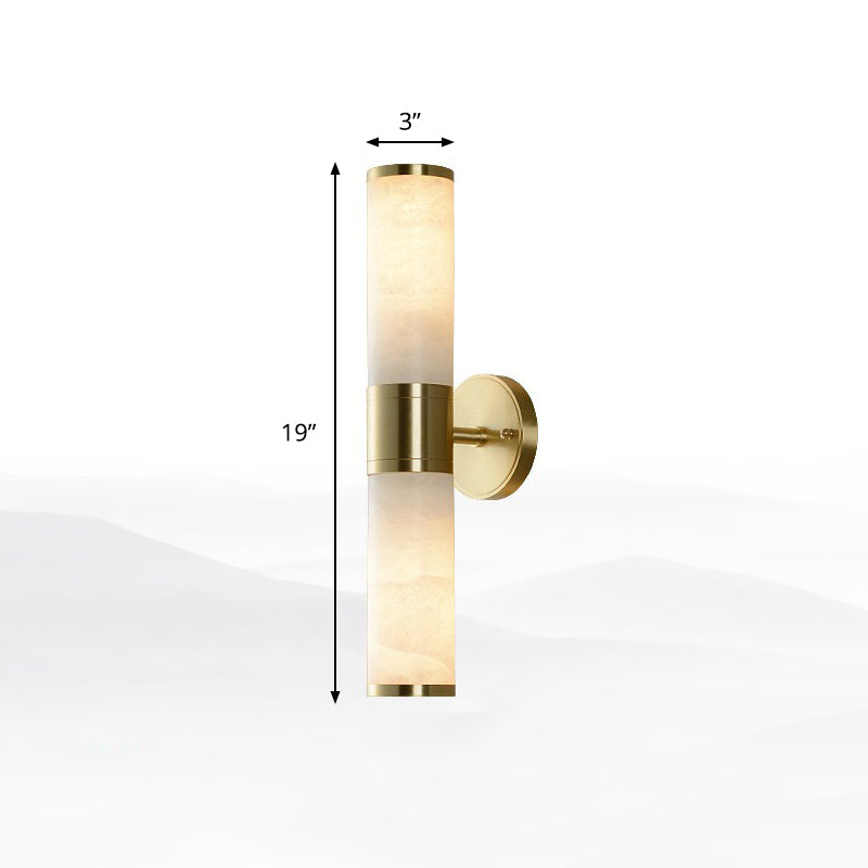 Minimalistische pilaarvormige stenel licht marmeren bedmuurlampbevestiging in wit en messing