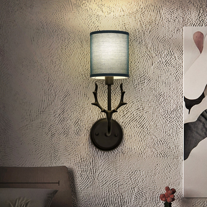 Rustic Cylinder Sconce Lamp 1 Bulb Resin and Fabric Wall Mounted Light in Black/White with Antler Decoration
