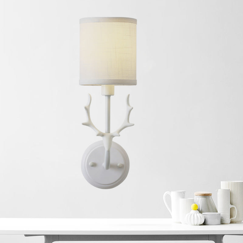 Rustic Cylinder Sconce Lamp 1 Bulb Resin and Fabric Wall Mounted Light in Black/White with Antler Decoration