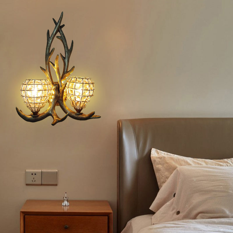 Resin Antler Wall Lighting Country 2-Light Bedroom Sconce Light Fixture in Brown/Gold with Globe Crystal Shade