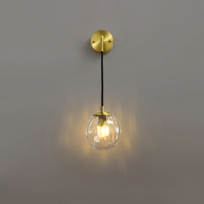 Clear Ripple Glass Ball Wall Light Minimalistic 1-Light Brass Sconce Fixture for Dining Room