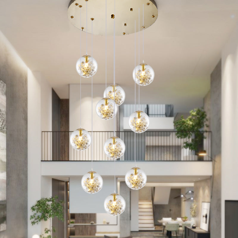 Minimalist Sphere Multi Light Chandelier Clear Glass 10-Head Stairs Pendant Lamp with Metal Flower Decor in Gold