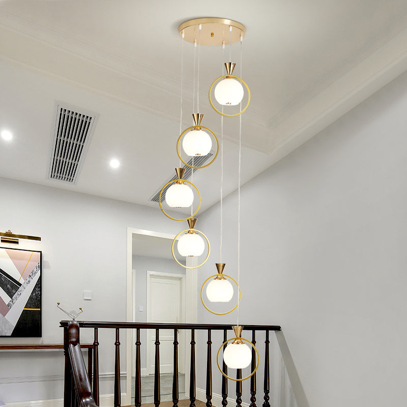 Sospensione a forma di palla Light Simplicity White Glass scale a 6 luci Multi pendente con anello di metallo in oro