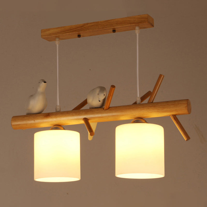 Opal Glass Cylinder Pendant Light Nordic Wood Island Light with Resin Bird Decor