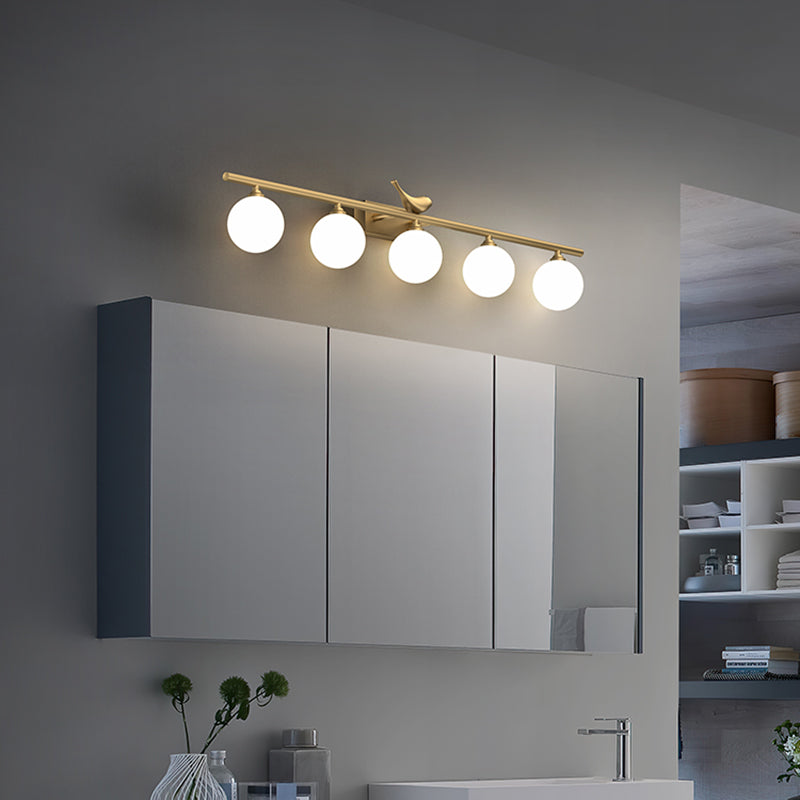 Ball Bathroom Vanity Sconce Opal Glass Postmodern Wall Light with Bird Decor in Brass