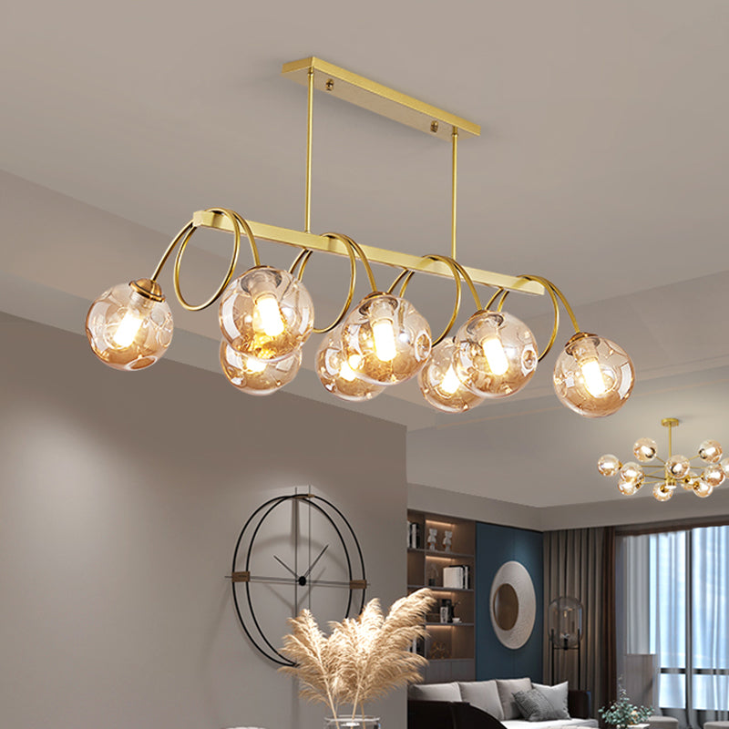 Gold Finish Spiral Island Light Post-Modern Metal Ceiling Hang Lamp with Ball Dimpled Glass Shade