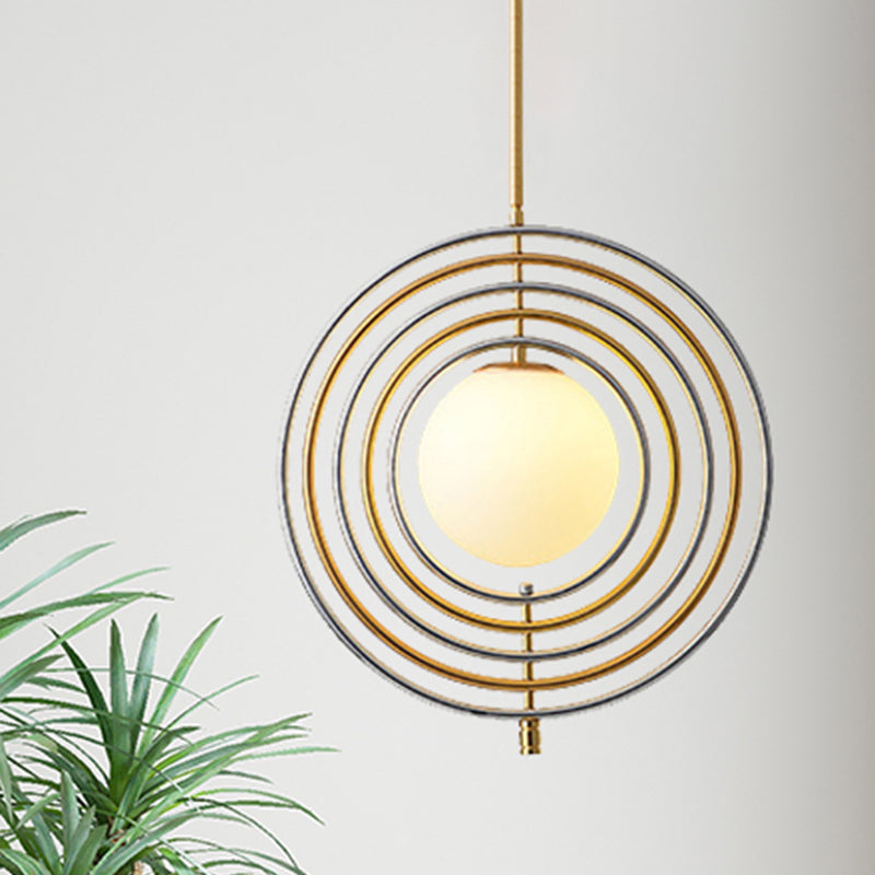 Luz colgante de órbita de vidrio esmerilado con comedor de anillo concéntrico 1 luz colgante moderna en oro