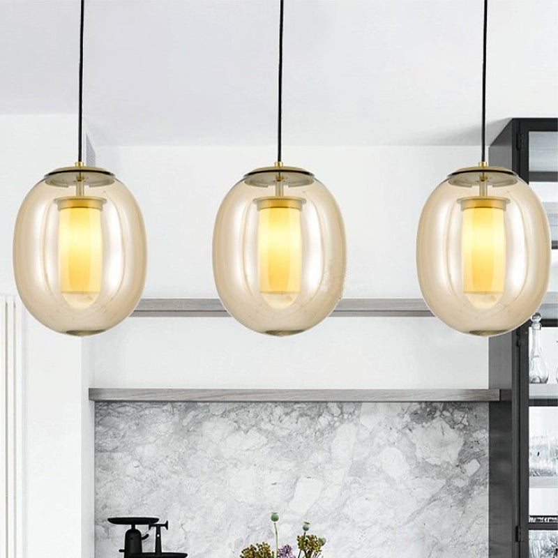 Kit de lámpara colgante ovalada de vidrio transparente contemporáneo 7 "/8.5" de ancho 1 cabeza de oro Luz de oro para comedor