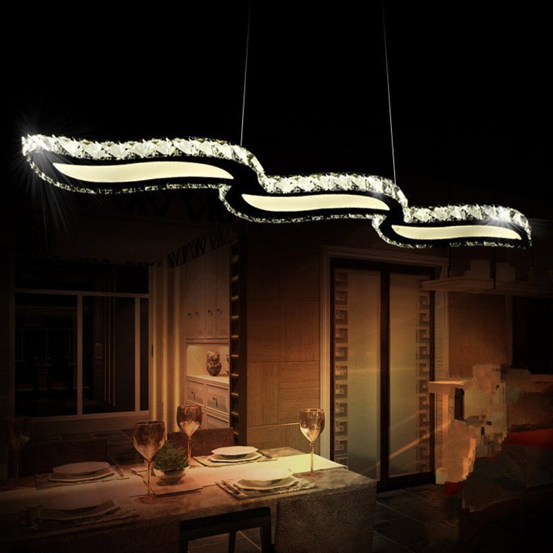 Moderno lussuoso lussuoso isola a pendente illuminazione ondata prismatica a soffitto di cristallo ottico per soggiorno