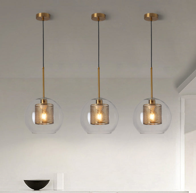 Éclairage de pendentif rond unique contemporain avec une teinte en verre transparent