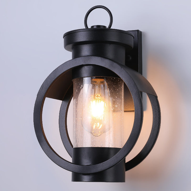 Industrial Style Black Wrought Iron Wall Sconce with Seeded Glass Cylinder Shade Single Bulb Outdoor Lighting Fixture