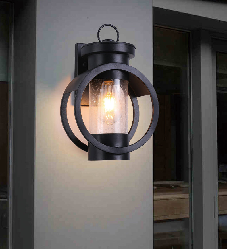 Industrial Style Black Wrought Iron Wall Sconce with Seeded Glass Cylinder Shade Single Bulb Outdoor Lighting Fixture