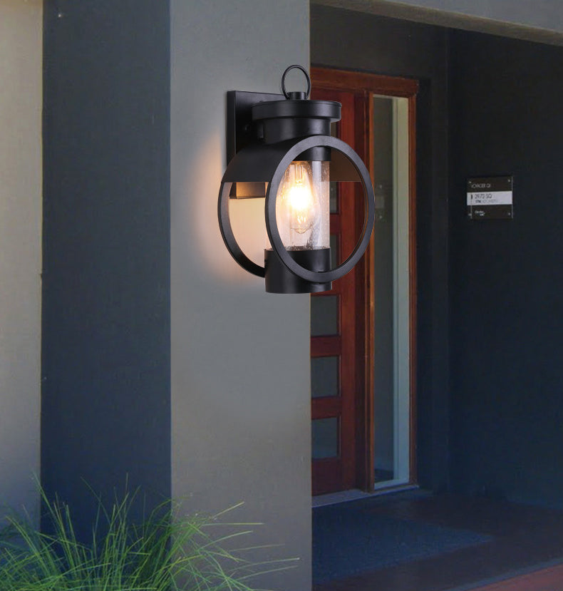 Industrial Style Black Wrought Iron Wall Sconce with Seeded Glass Cylinder Shade Single Bulb Outdoor Lighting Fixture