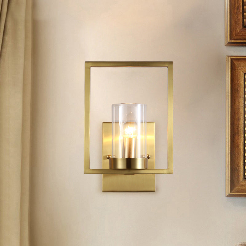 Cylindrical Bedroom Wall Sconce Clear Glass 1 Bulb Contemporary Wall Light Fixture in Brass with Frame