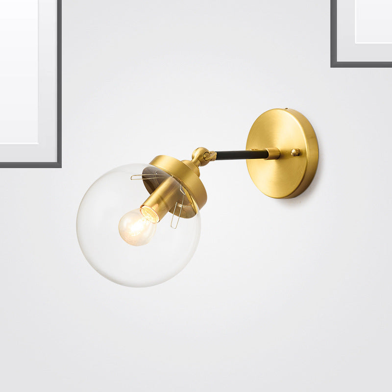 Adjustable Globe Sconce Light Simplicity 1 Bulb Brass Wall Mount Lamp with Transparent Glass Shade