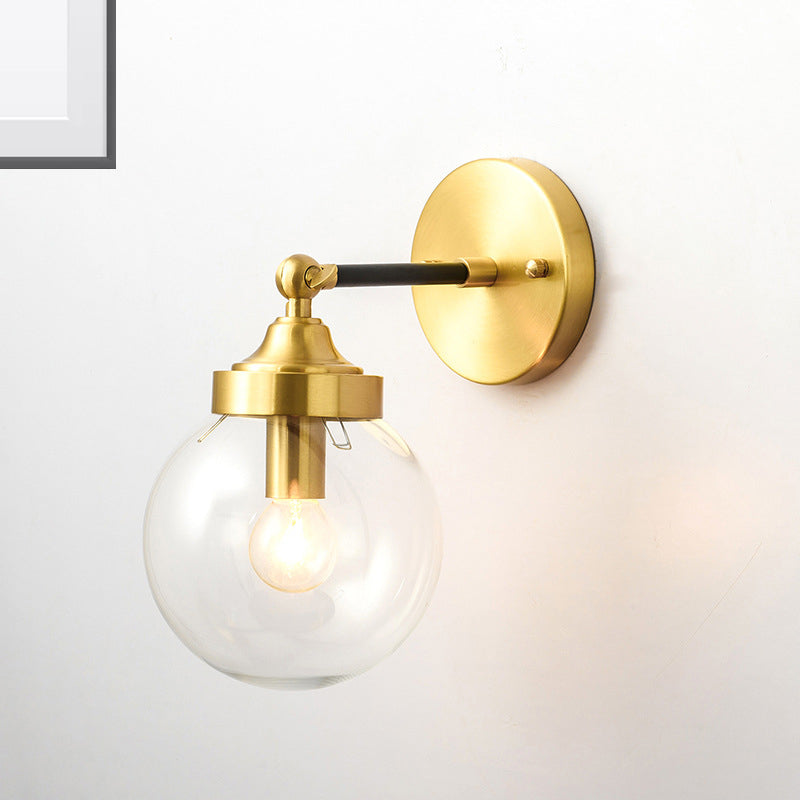 Adjustable Globe Sconce Light Simplicity 1 Bulb Brass Wall Mount Lamp with Transparent Glass Shade