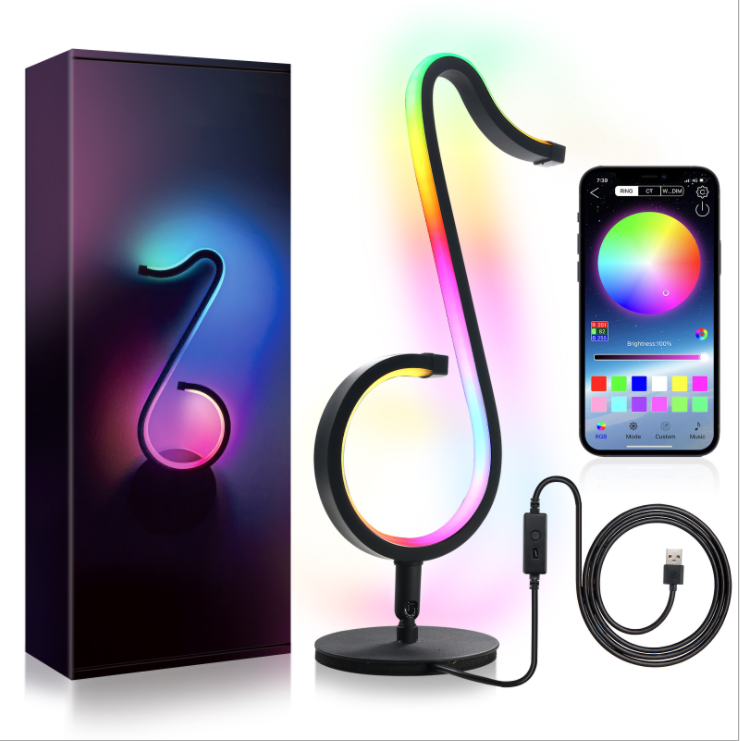 Lampada da tavolo a forma di nota musicale in metallo. Luce notturna a LED nera minimalista alla moda per camera da letto