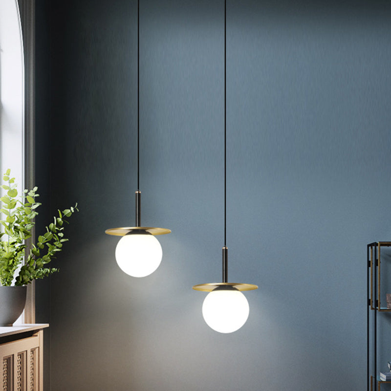 7" Wide White Glass Globe Mini Hanging Light with Round Metal Sheet Decoration Post-modern Style Simplicity Lighting Pendant in Gold